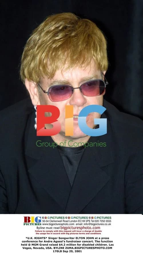 Elton John at Agassi fundraiser press conference