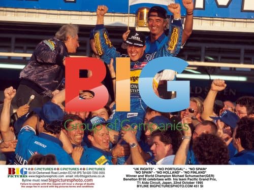 Michael Schumacher celebrates Benetton win