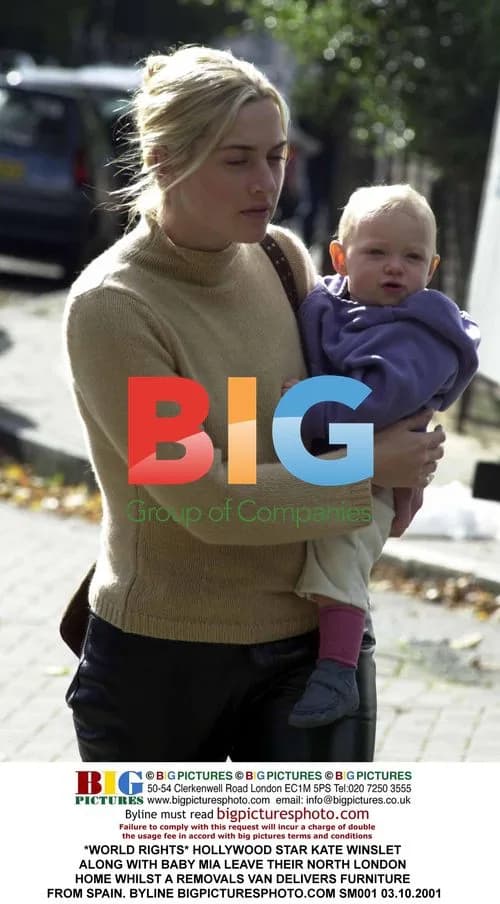 Kate Winslet with baby Mia leave home