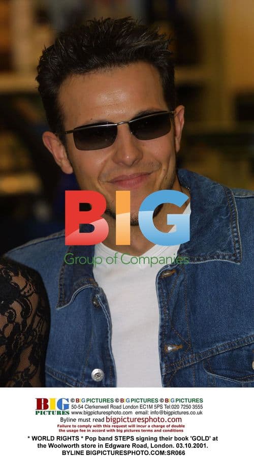 STEPS signing 'GOLD' book at Woolworth store