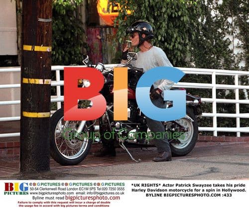 Patrick Swayze rides Harley in Hollywood