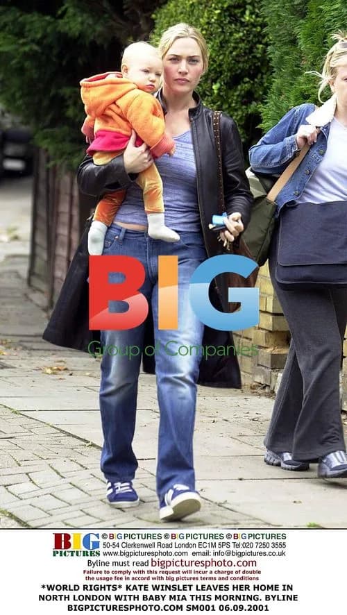 Kate Winslet leaves home with baby Mia
