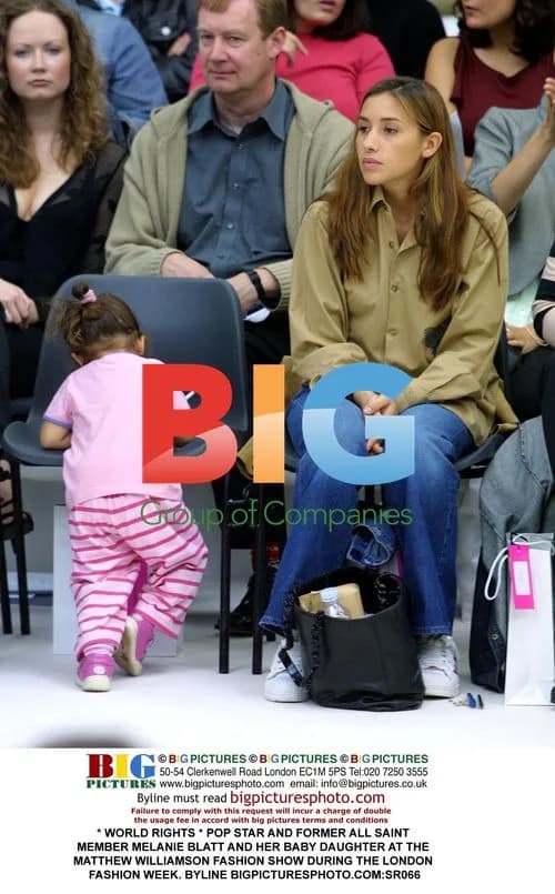 Melanie Blatt and daughter at Matthew Williamson show