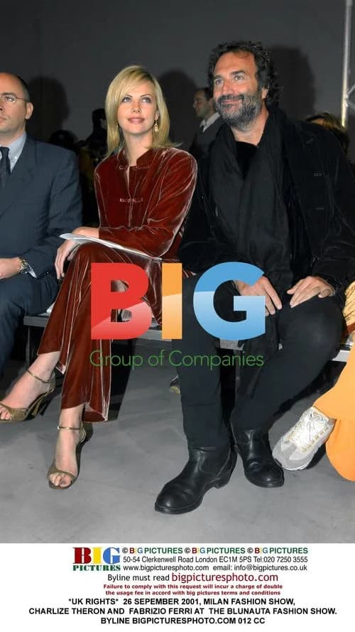 Charlize Theron and Fabrizio Ferri at Milan Fashion Show