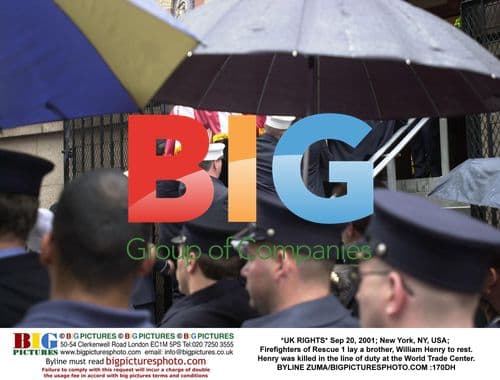 Firefighters bury colleague killed on 9/11