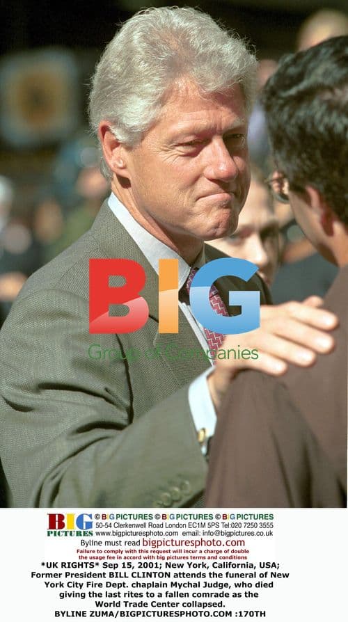 Bill Clinton attends firefighter's funeral