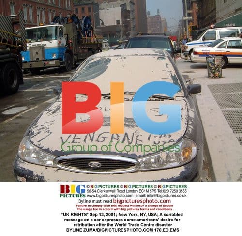 Car scribbled with "I Love USA" message