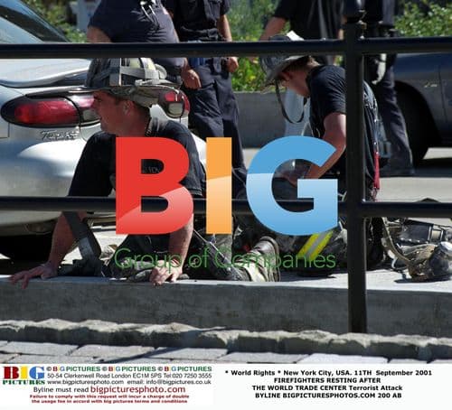 Firefighters Resting After 9/11 Attack