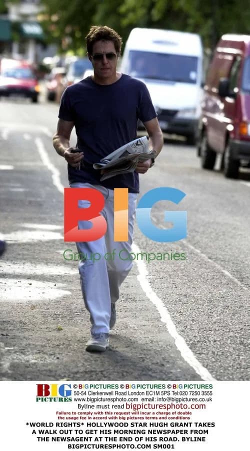 Hugh Grant gets morning newspaper