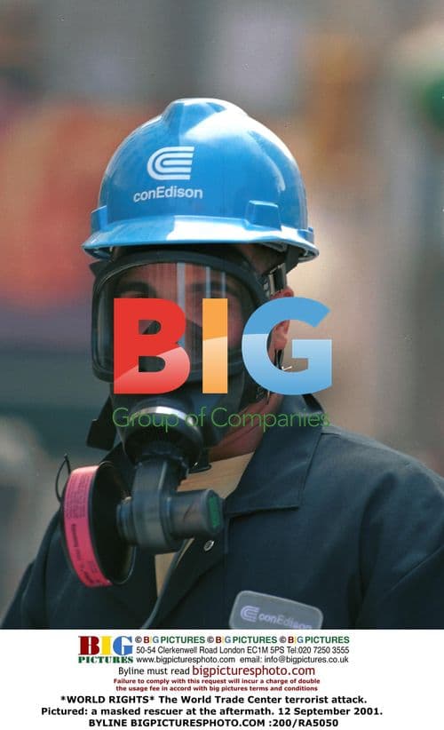 Masked rescuer at WTC attack aftermath