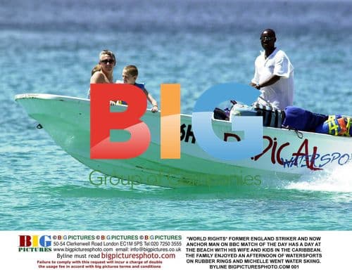 Former England Striker Enjoys Beach Day with Family