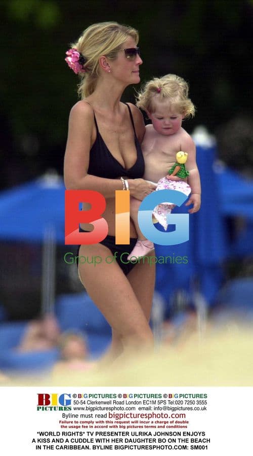 Ulrika Johnson Enjoys Beach Time with Daughter