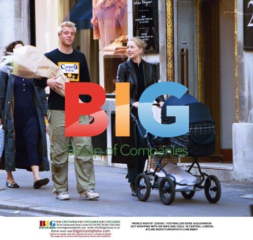 Footballer Eidse Gudjohnson out shopping with family in London