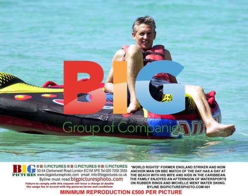 Former England Striker Enjoys Beach Day in Caribbean