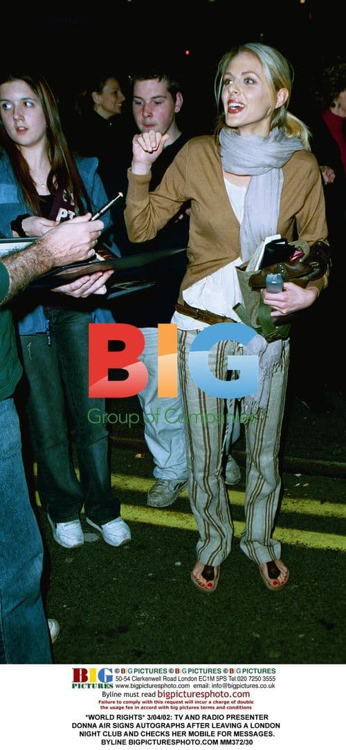 Donna Air signs autographs after night out