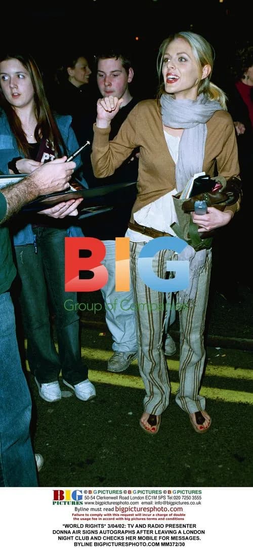 Donna Air signs autographs after night out