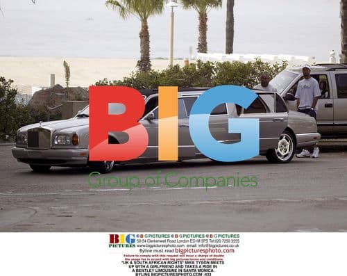 Mike Tyson rides Bentley with girlfriend