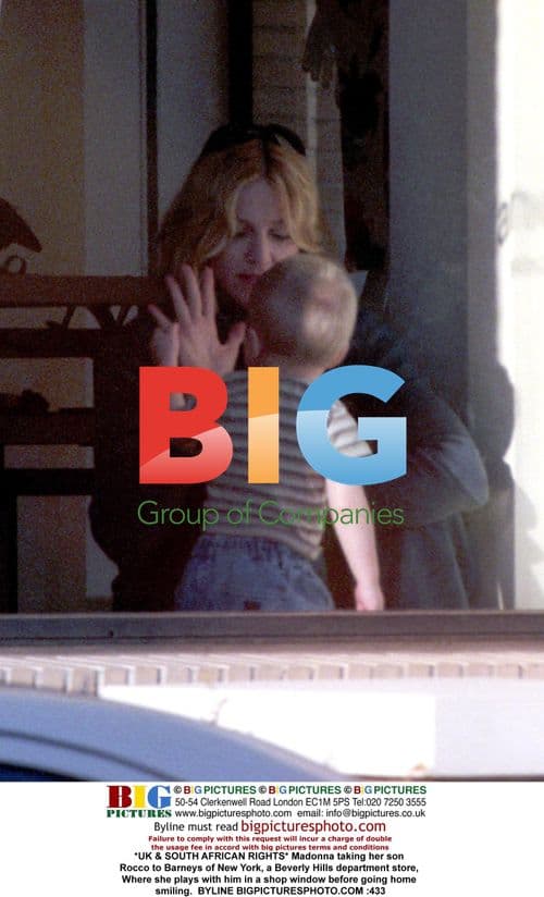 Madonna and son Rocco at Barneys of New York