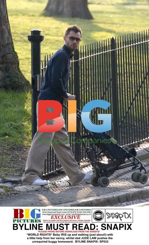 Jude Law and baby Iris on walk