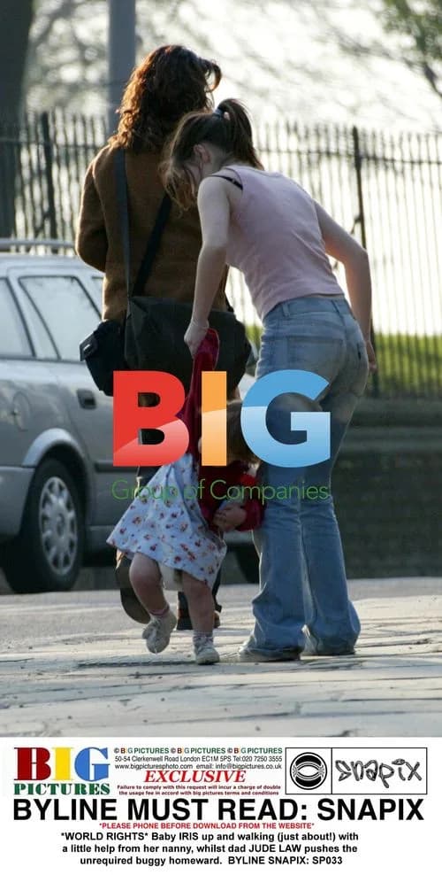 Baby Iris walking with nanny, Jude Law