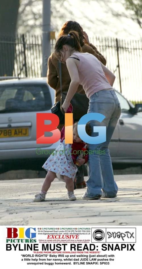 Baby IRIS takes steps with nanny, Jude Law