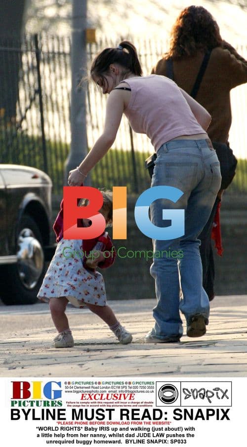 Baby IRIS takes steps with nanny, Jude Law nearby