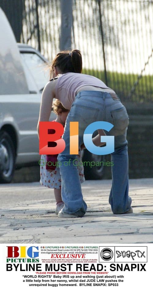 Baby Iris walking with nanny, Jude Law