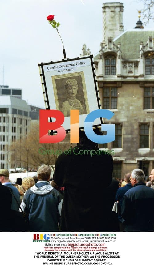 Mourner Holds Plaque at Queen Mother's Funeral