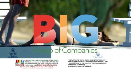 Cindy Crawford and husband on Barbados beach