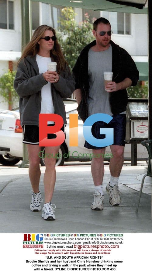 Brooke Shields and husband Chris Henchy in park