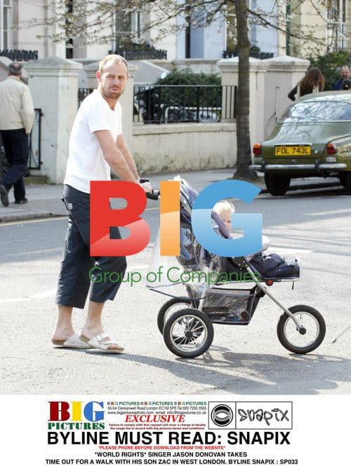 Jason Donovan and son Zac out for a walk