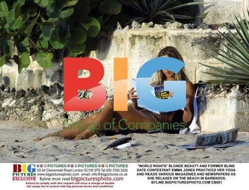 Blonde Beauty Emma Jones Relaxes on Barbados Beach