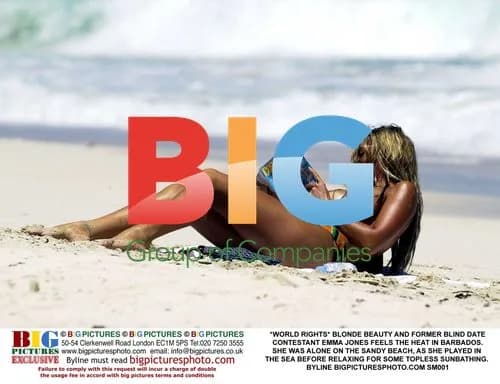 Blonde beauty Emma Jones topless in Barbados
