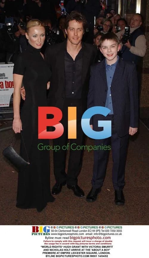HUGH GRANT, VICTORIA SMURFIT, AND NICHOLAS HOLT AT "ABOUT A BOY" PREMIERE