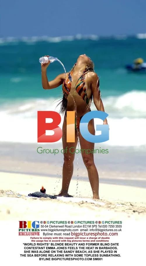 Blonde Beauty Emma Jones Sunbathes Topless in Barbados