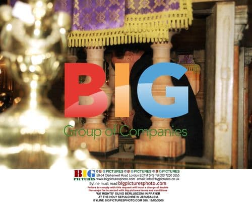 Silvio Berlusconi Prays at Holy Sepulchre