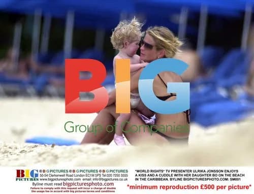 Ulrika Jonsson and daughter Bo on Caribbean beach