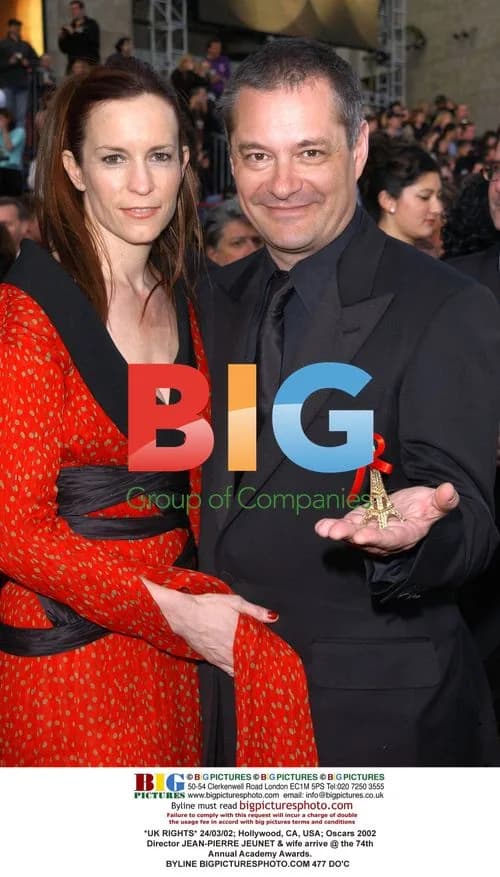 Director JEAN-PIERRE JEUNET & wife at Oscars 2002