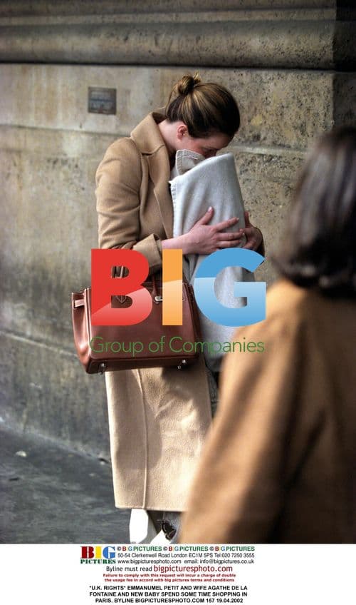 Emmanuel Petit and wife Agathe shop in Paris