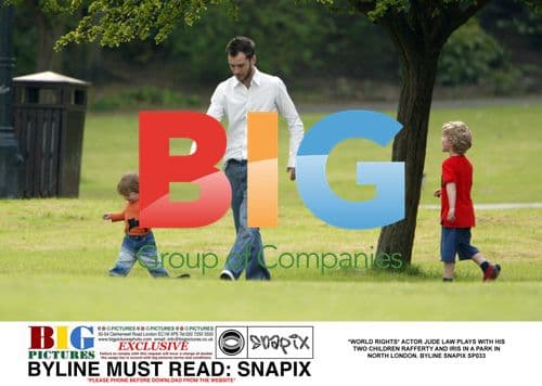 Jude Law with children in North London park