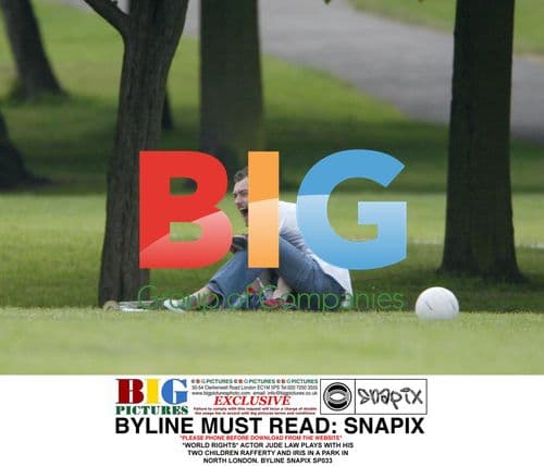 Jude Law plays with kids in London park