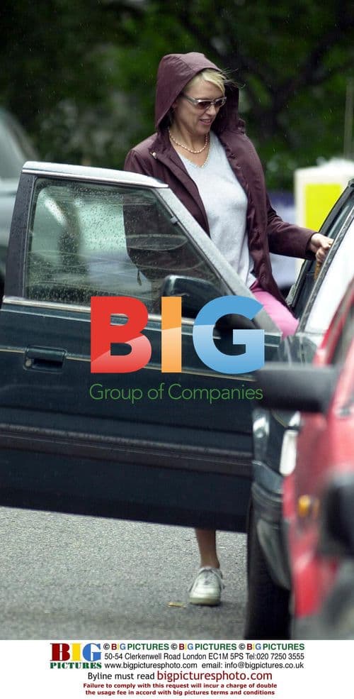 TV Presenter Anneka Rice with Son Leaving Store