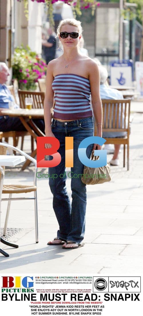 Jemma Kidd rests feet in North London sun