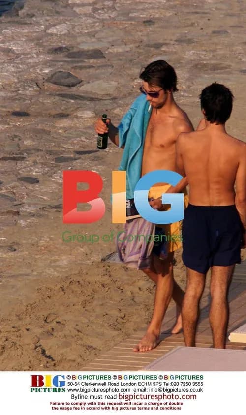 Jay Kay relaxes on beach and boat with friends