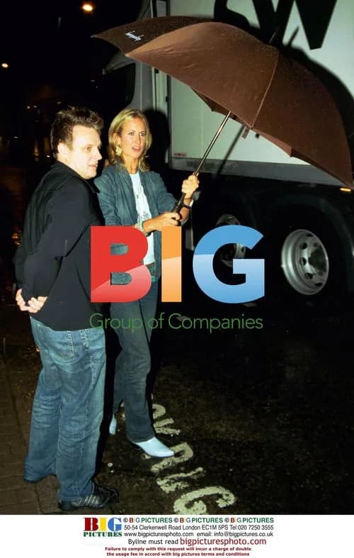 Lady Victoria Hervey and Rankin Under Umbrella