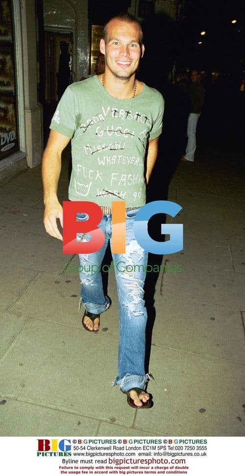 Footballer Freddie Ljundberg at club party