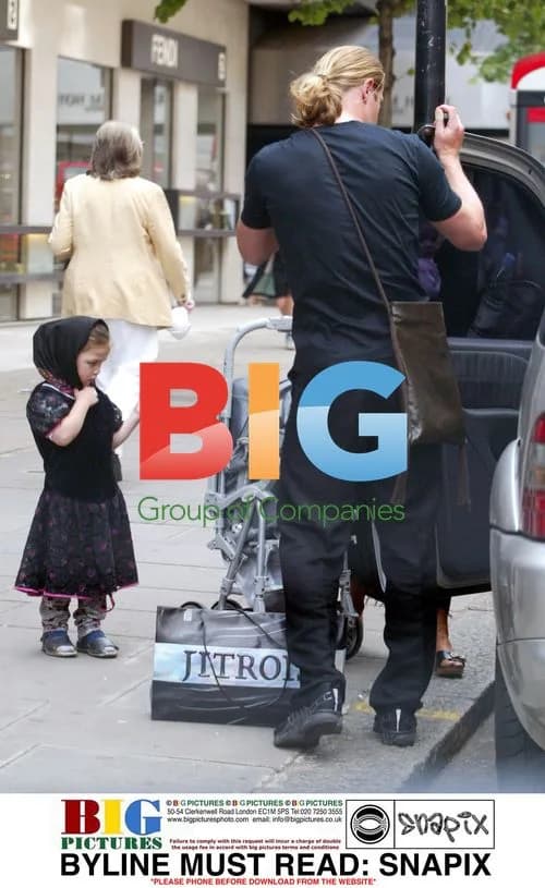 Emmanuel Petit out with wife and daughter