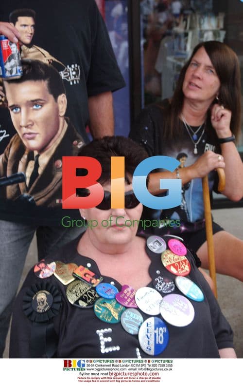 Elvis fans gather outside Graceland