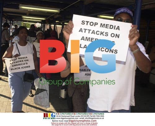 Protestors at Apollo Theatre press conference