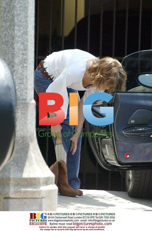 Drew Barrymore goes shoeless to yoga and shopping